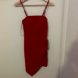 Francesca’s red dress with lace back.